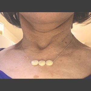 Beautiful , NIB, mother of Pearl necklace and earrings.